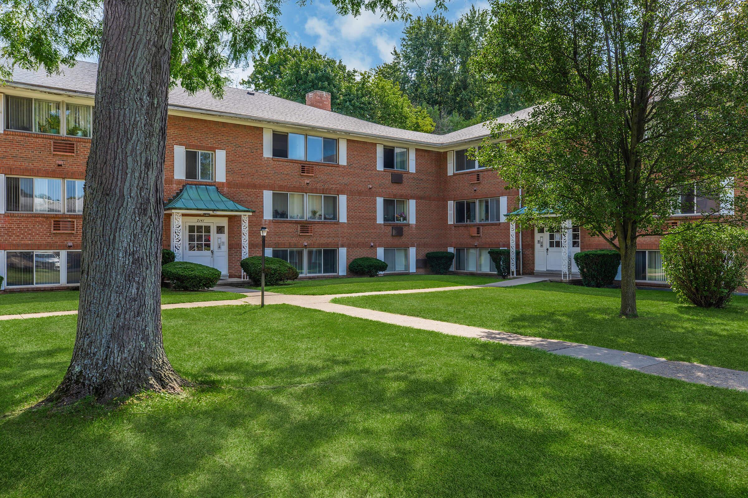 a large lawn in front of a house