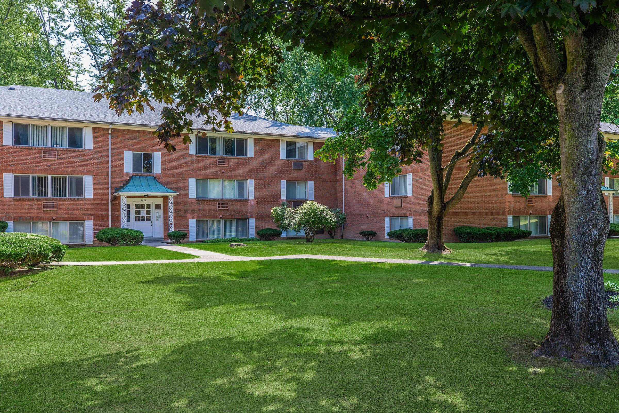 a large lawn in front of a house