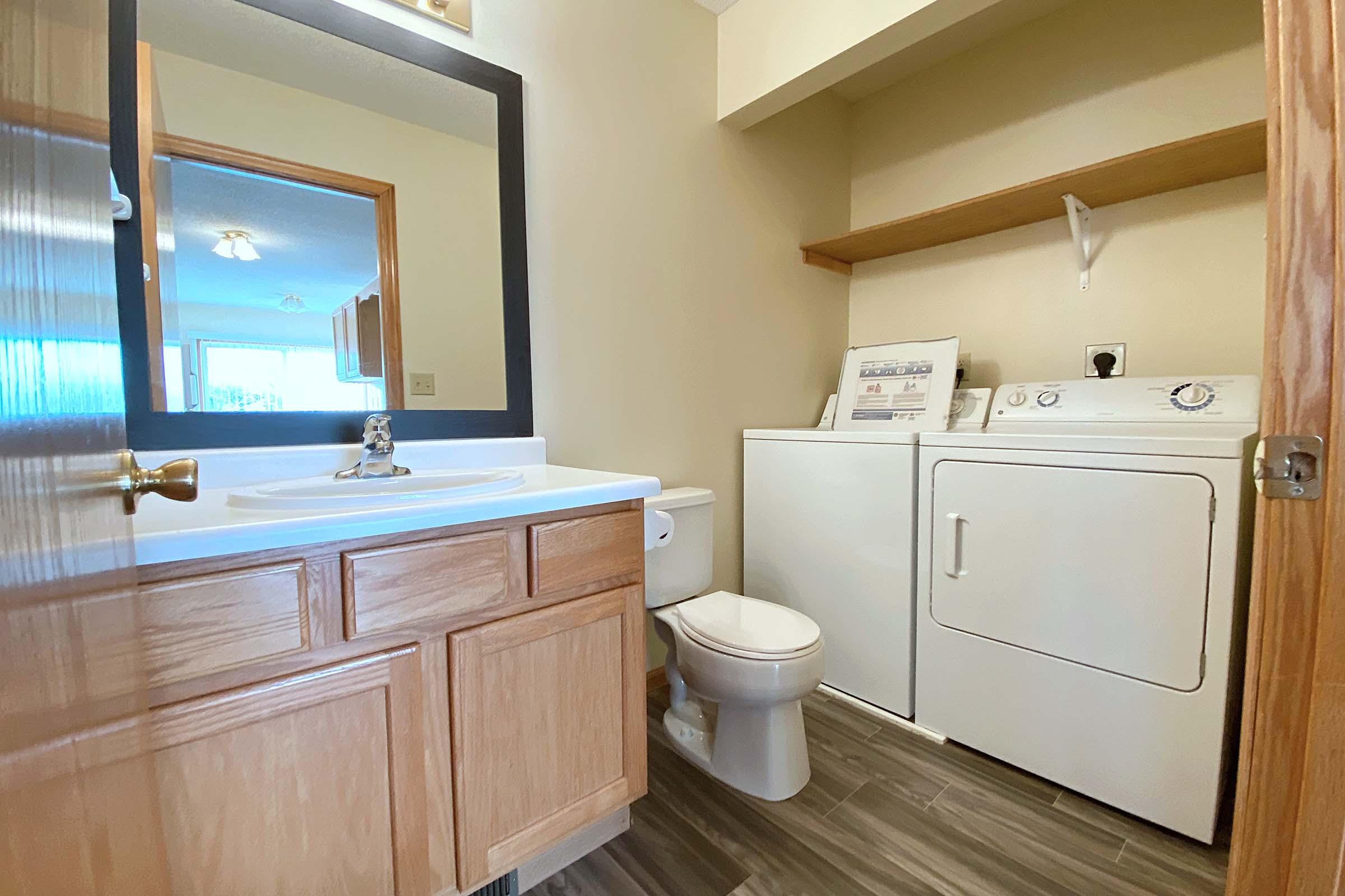 a kitchen with a sink and a window