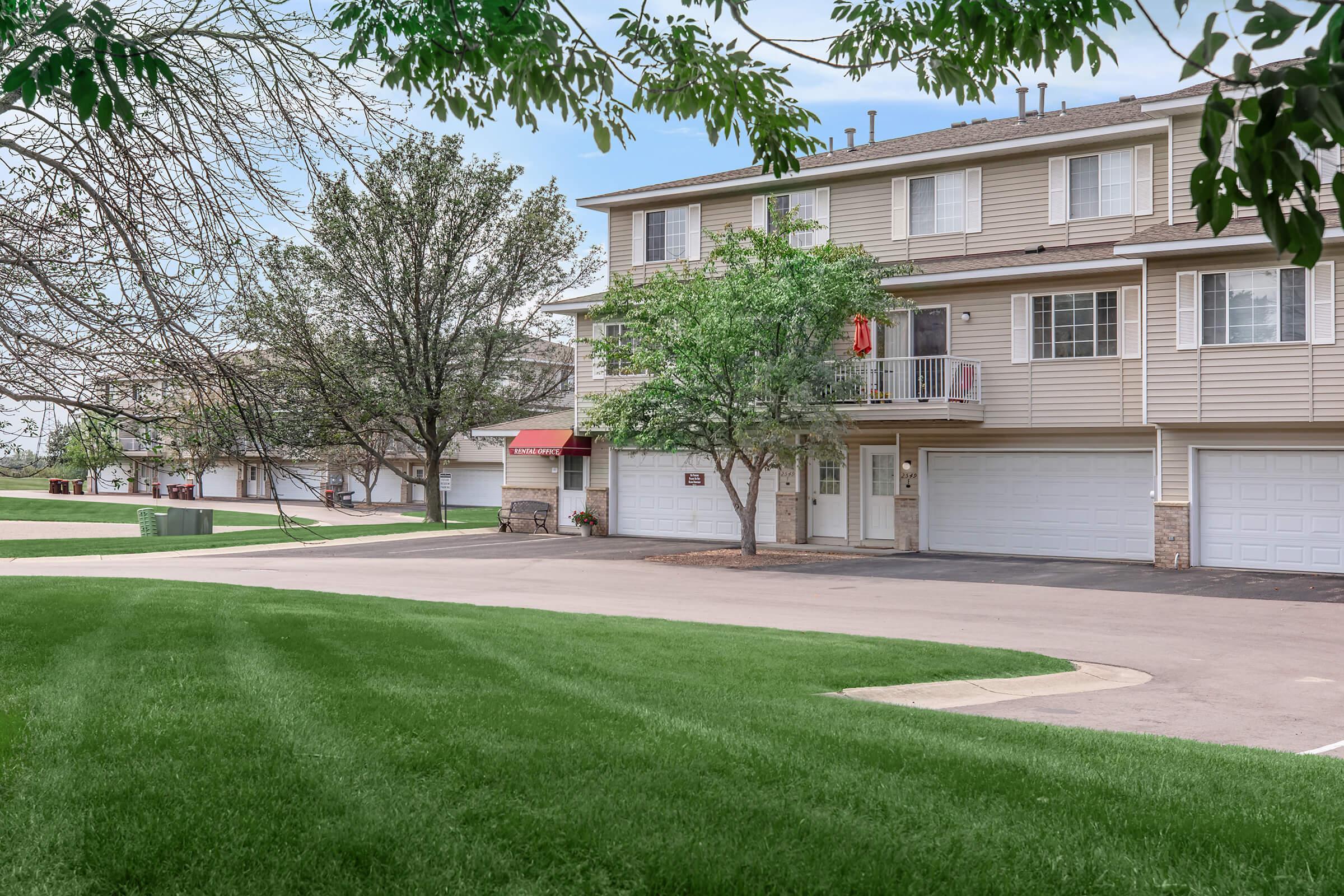 a large lawn in front of a house