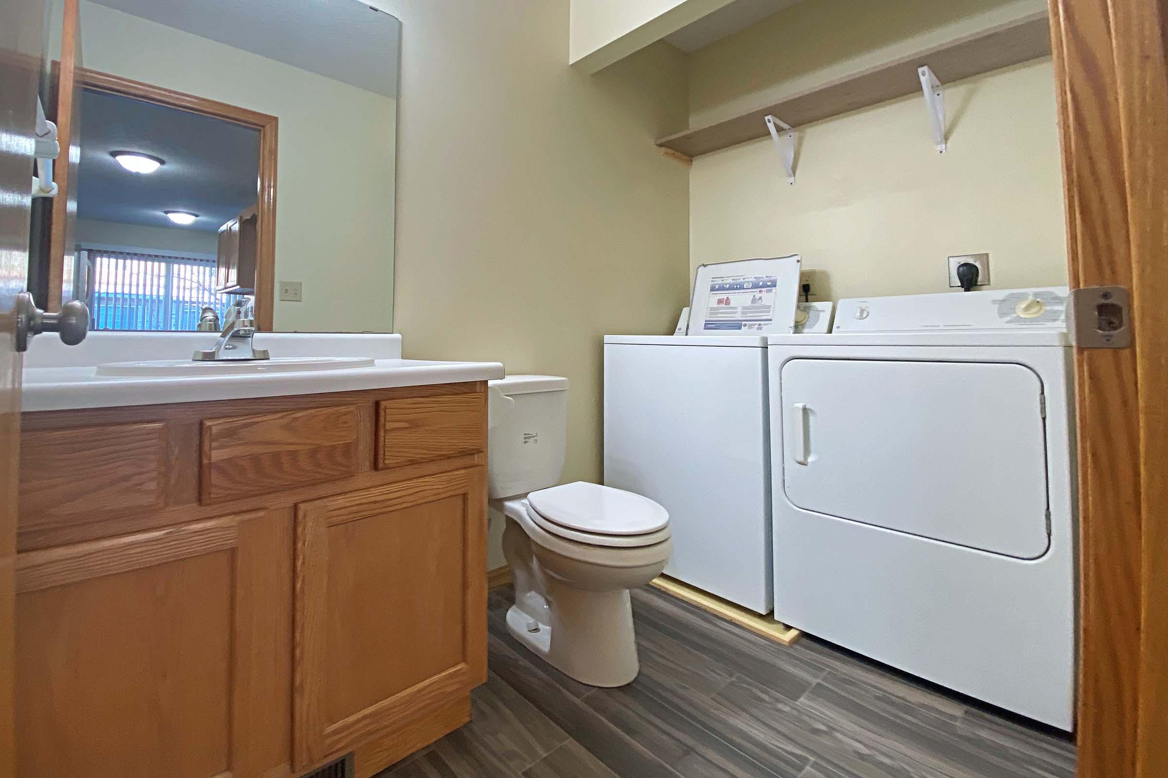 a kitchen with a sink and a window