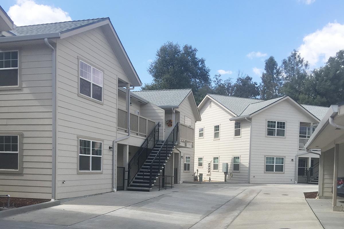 a house that is parked on the side of a building