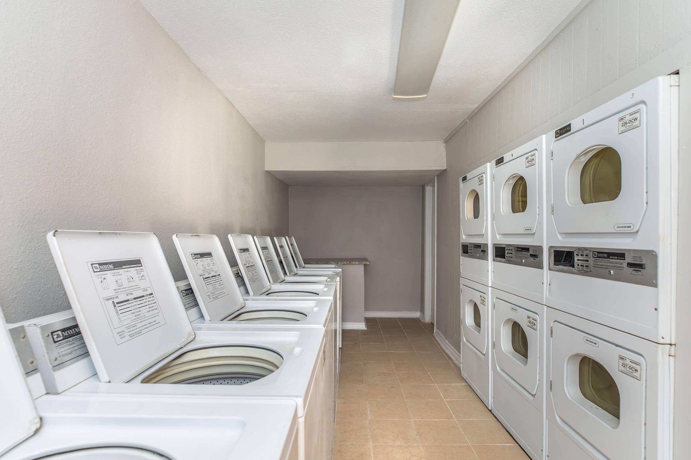 a kitchen with a stove top oven sitting inside of a refrigerator