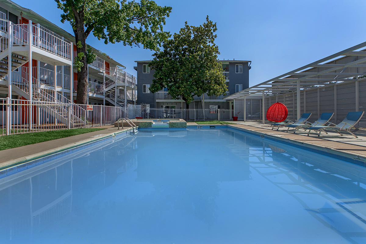 a pool next to a building