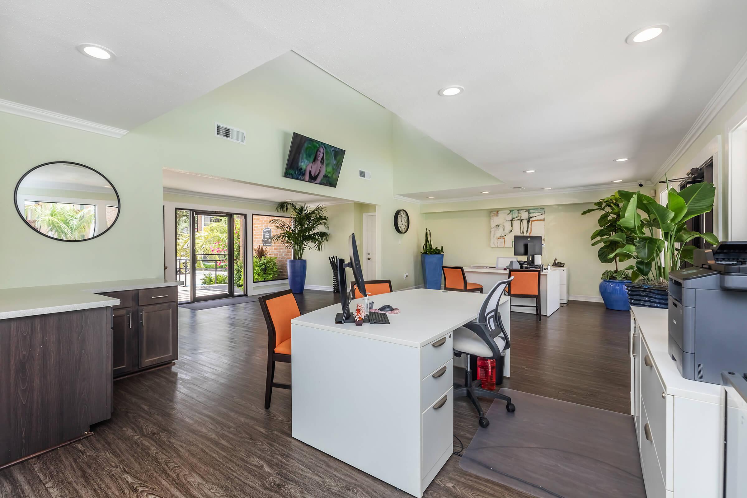 a room filled with furniture and a tv