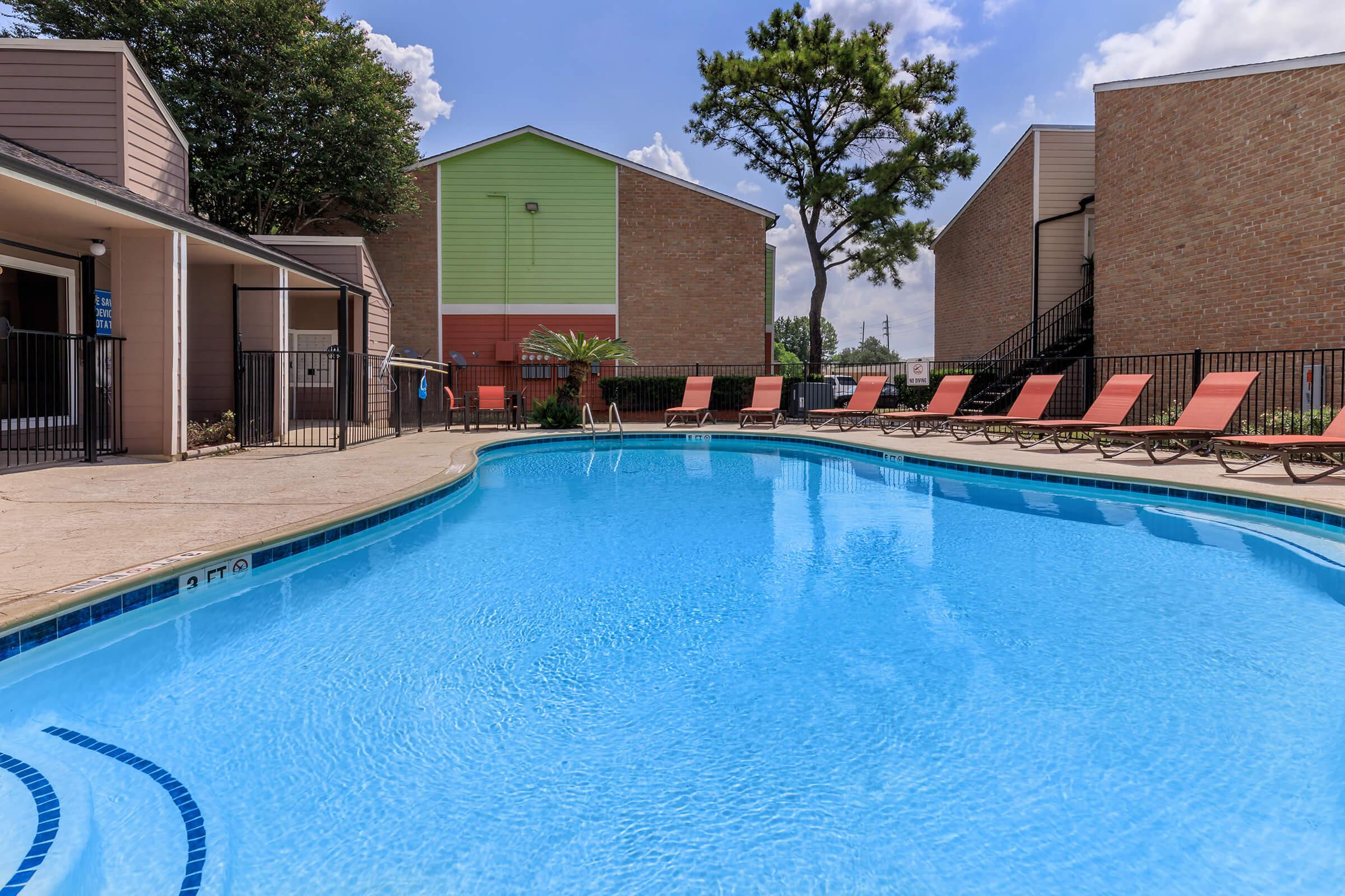 a house with a large pool of water