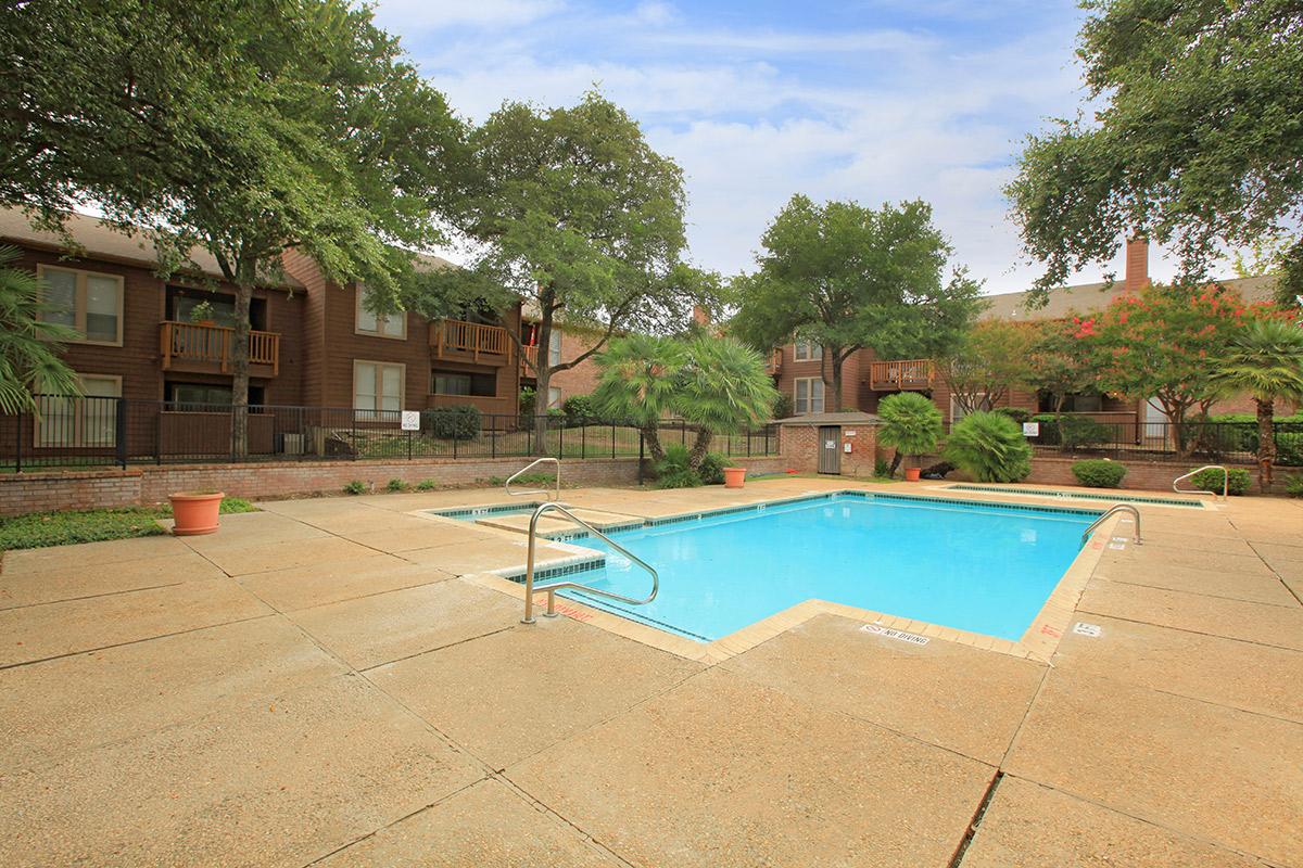 a pool next to a building