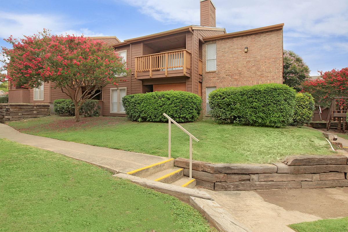 a large lawn in front of a house