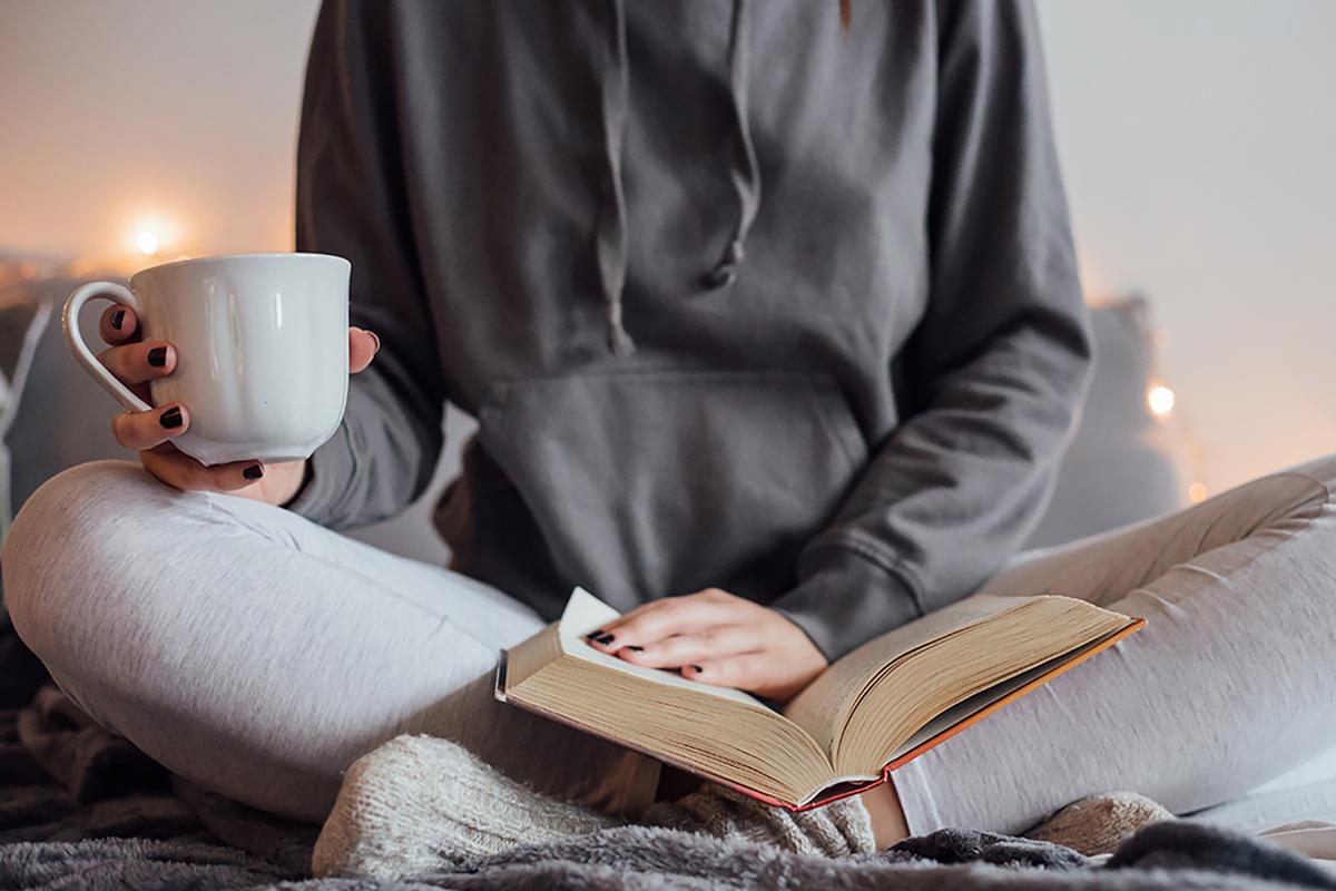 a person sitting on a bed