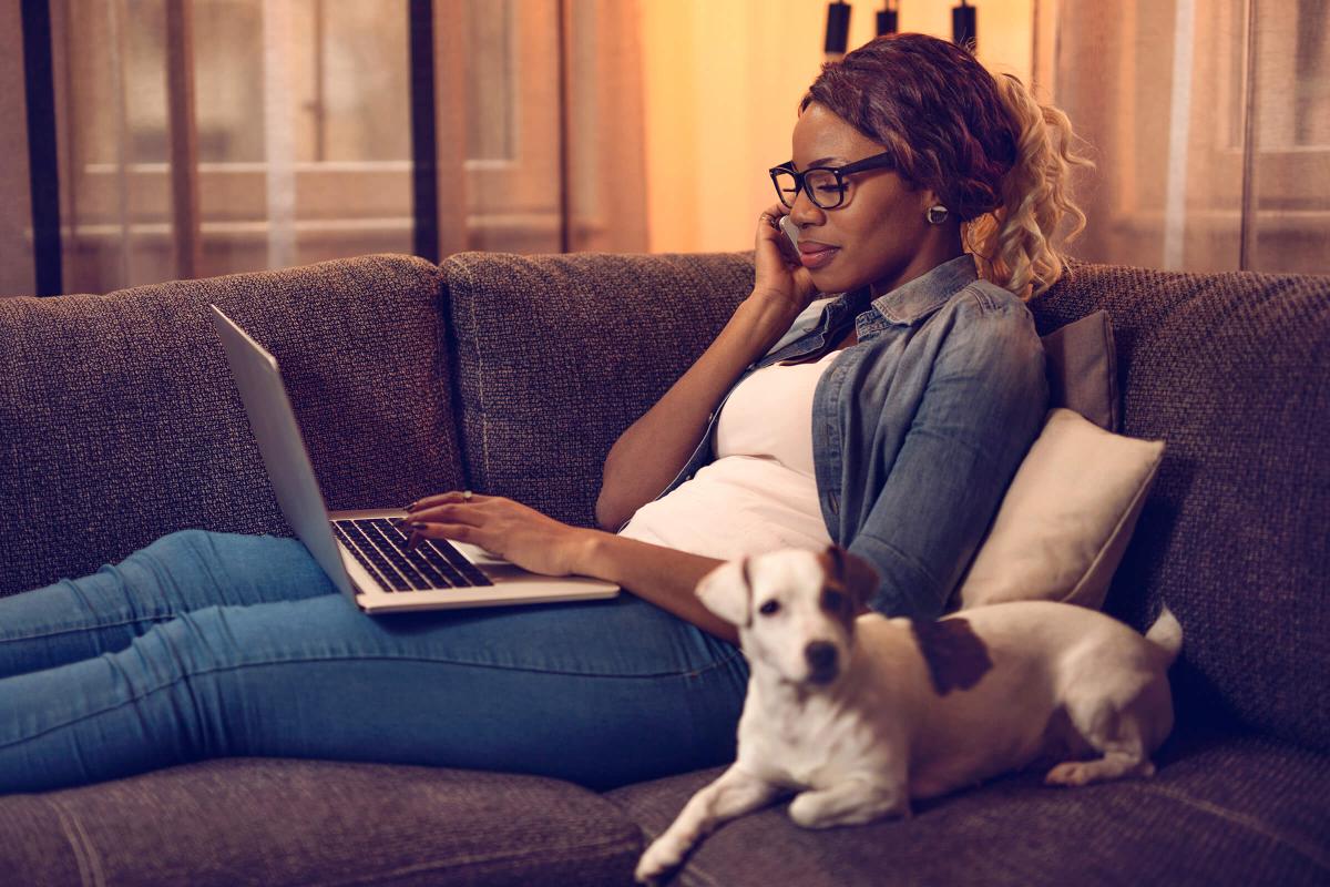 Woman with Dog on Couch-iStock_89295865.jpg