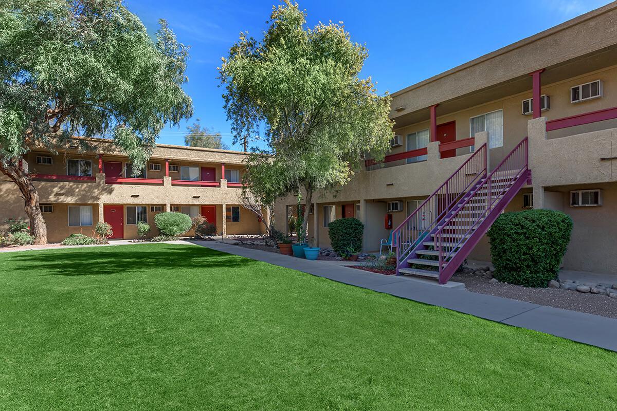 a large lawn in front of a house