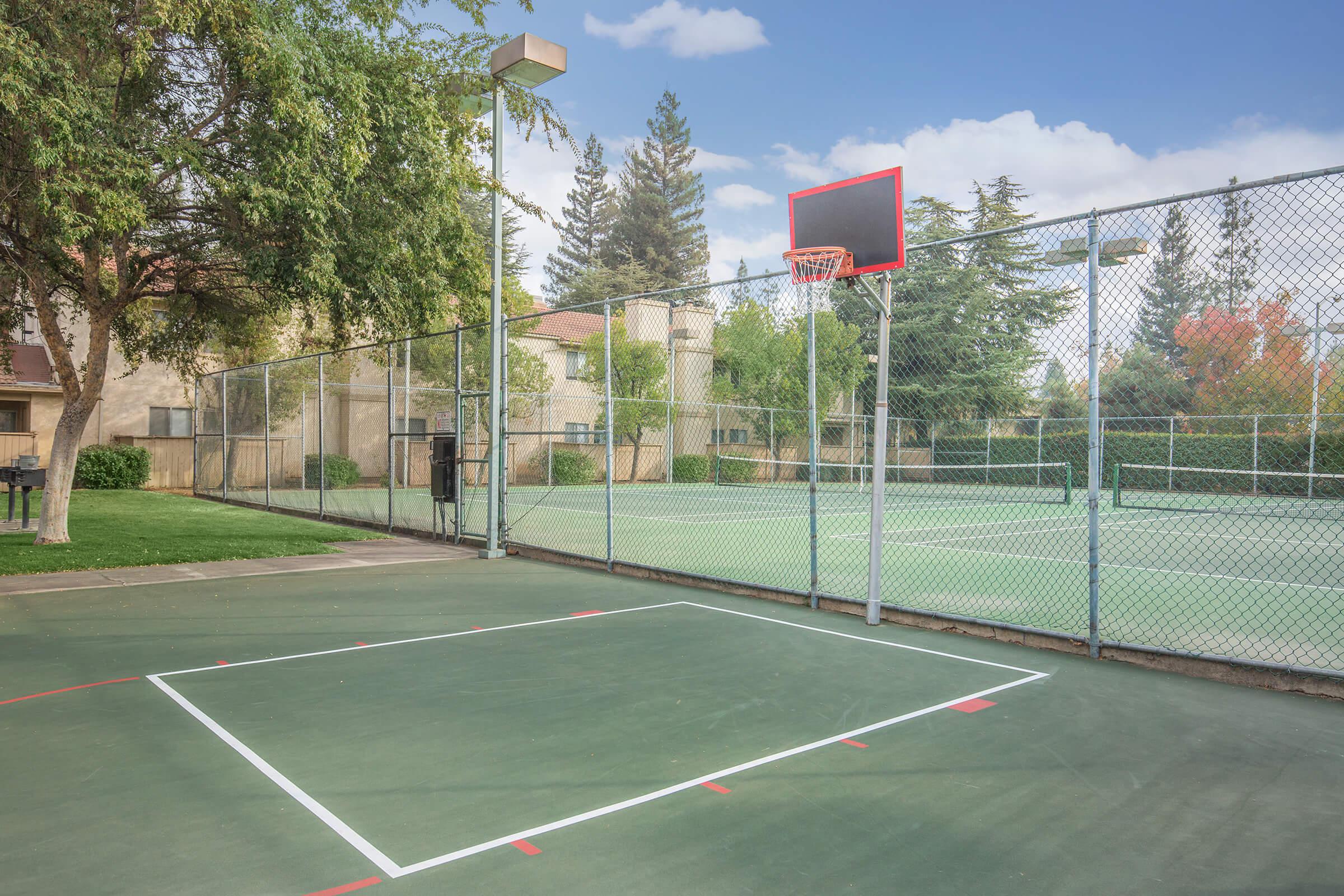 a person swinging a racket at a ball