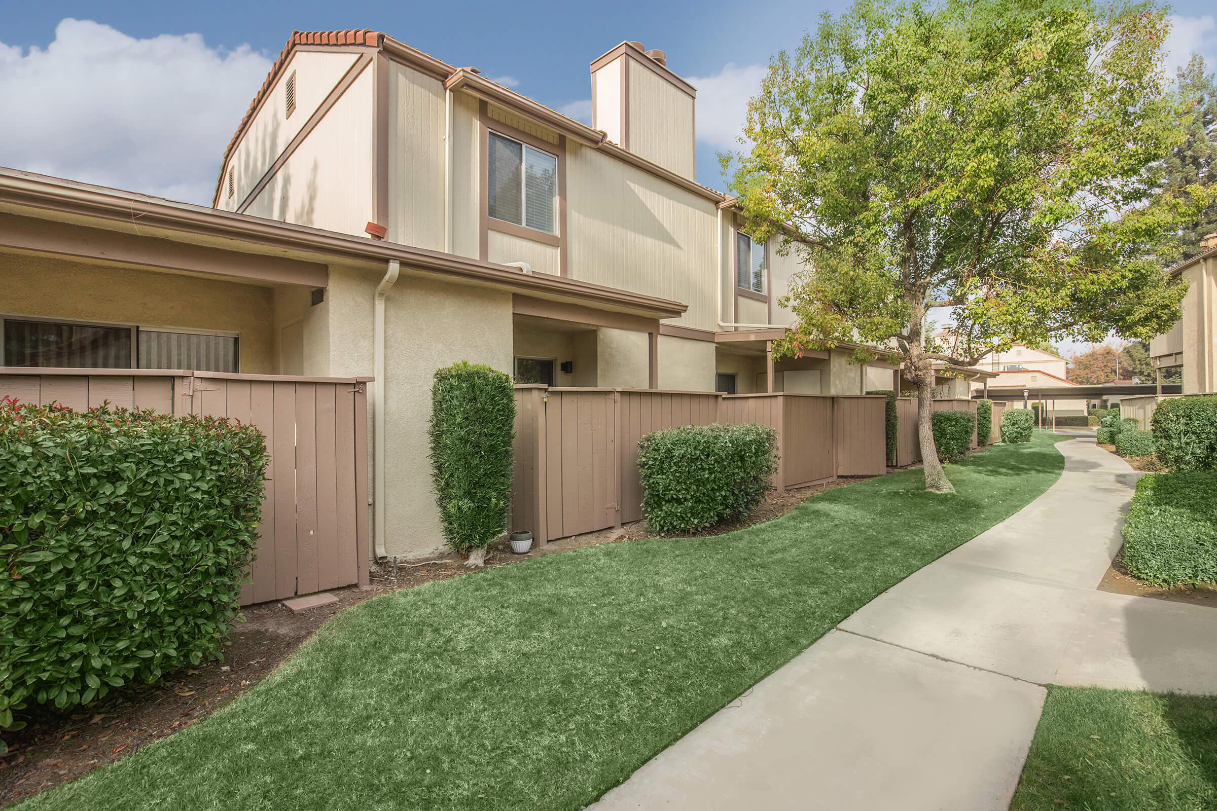 a large lawn in front of a house