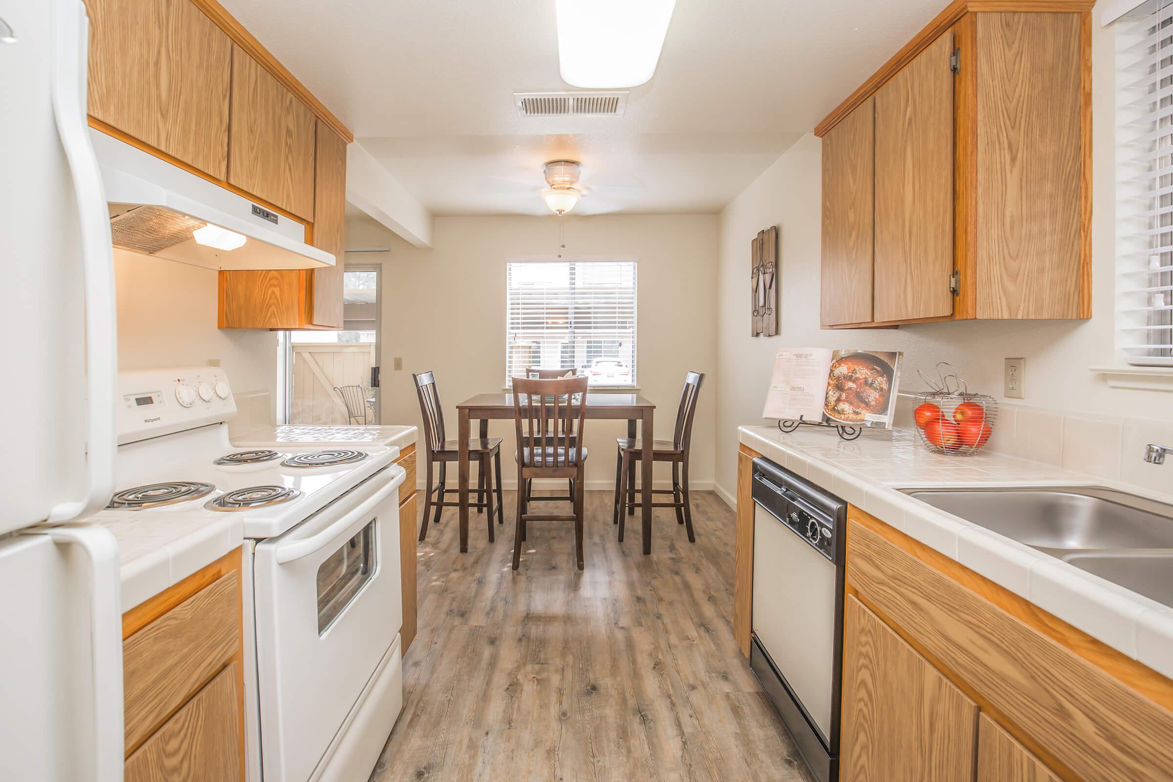 a kitchen with a dining table