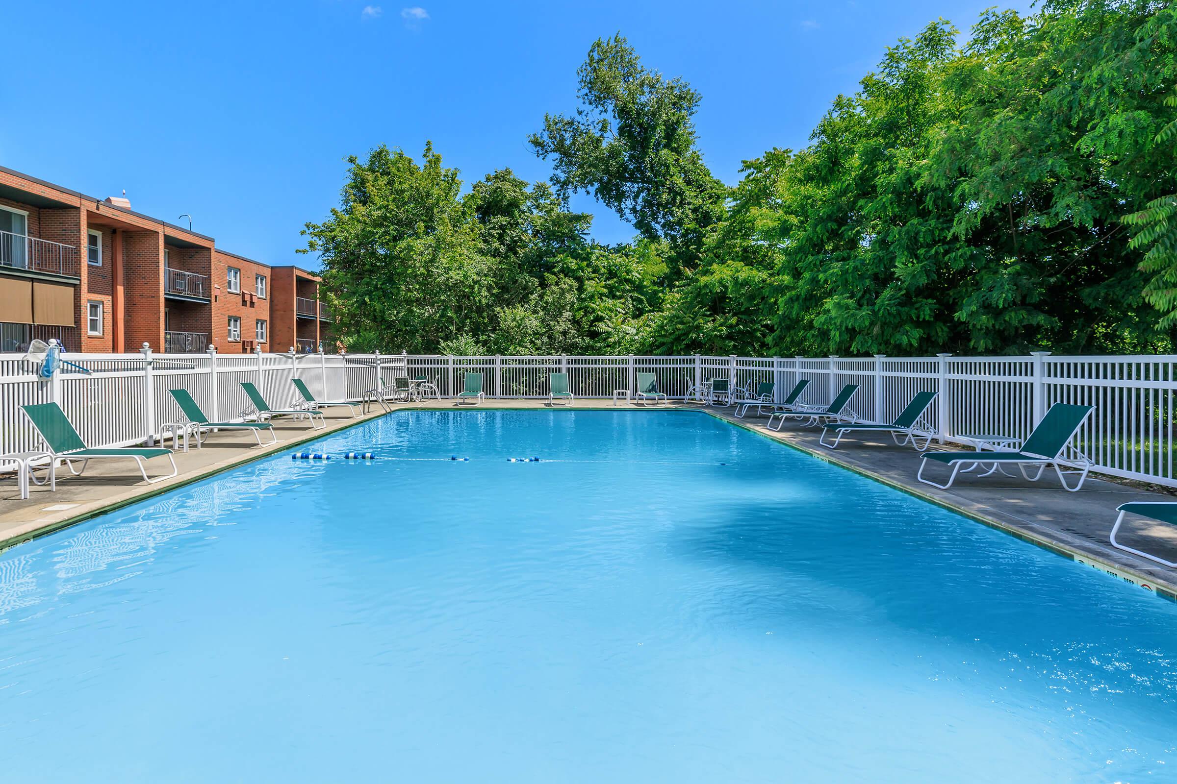 a pool next to a body of water