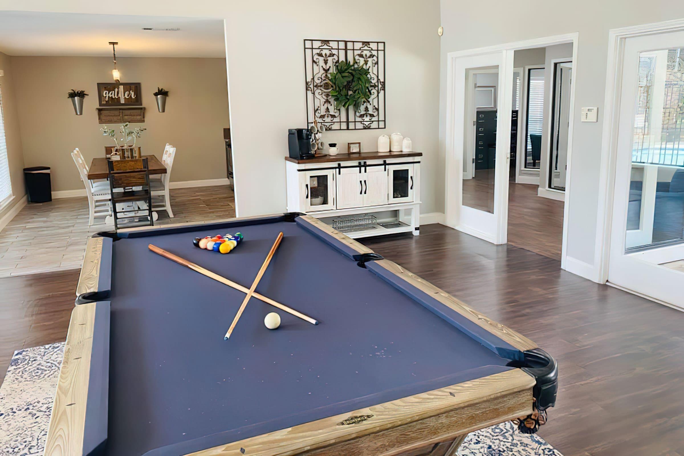 a room that has a clock on a table