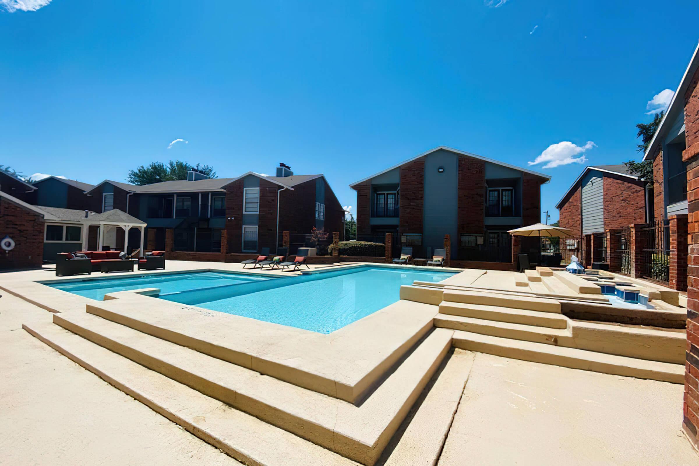 a pool next to a building