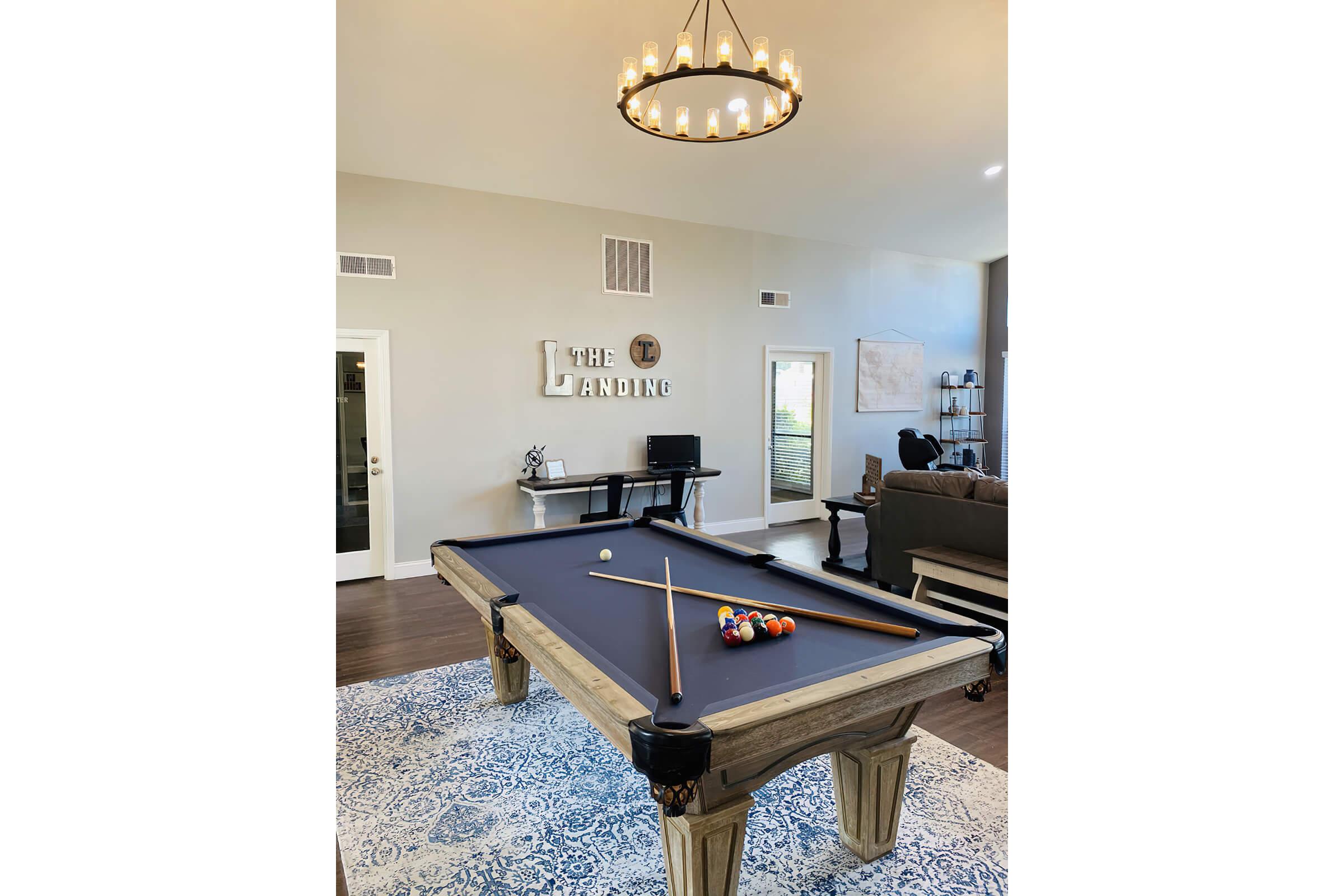 a kitchen with a table in a room