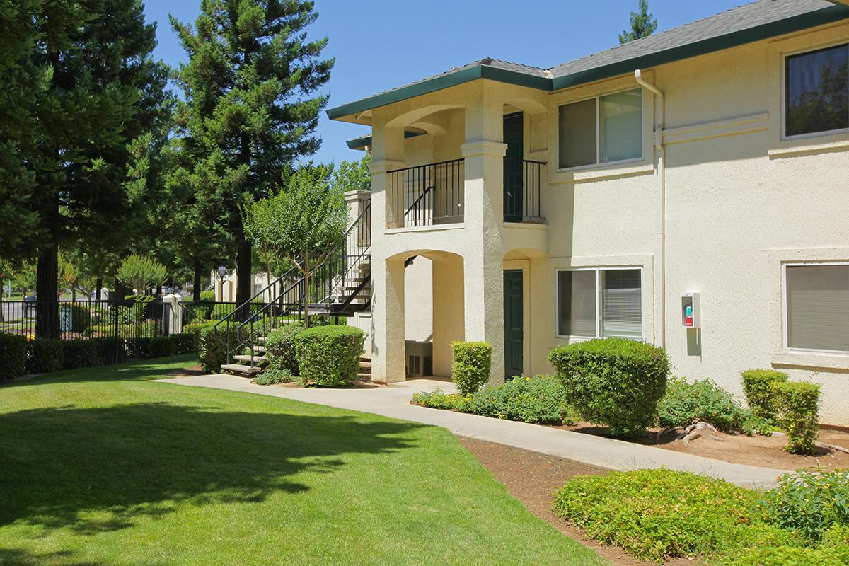 a large lawn in front of a house