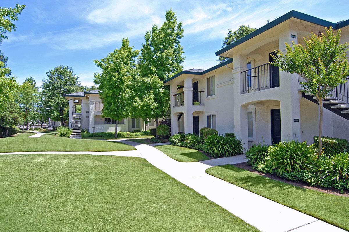 a large lawn in front of a house