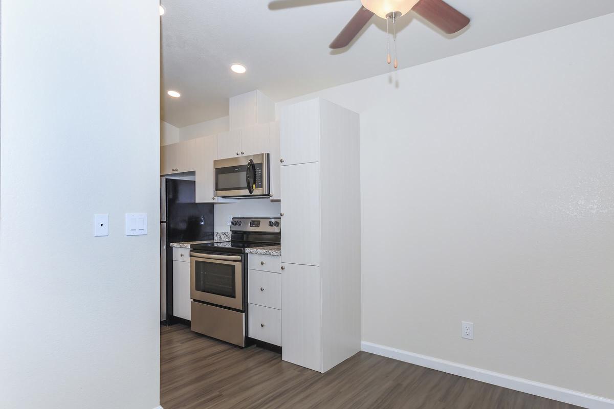 a large white refrigerator in a kitchen