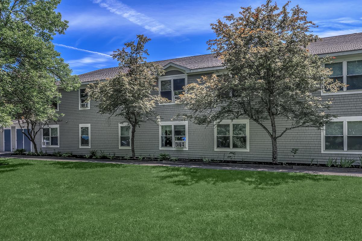 a large lawn in front of a house