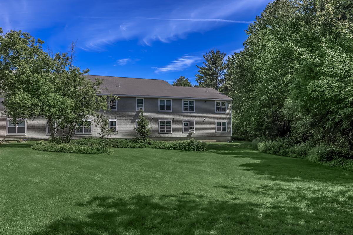 a large lawn in front of a house