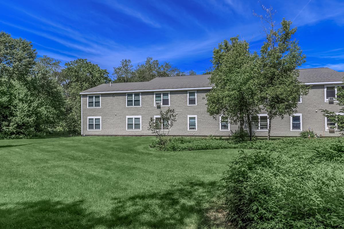 a large lawn in front of a house