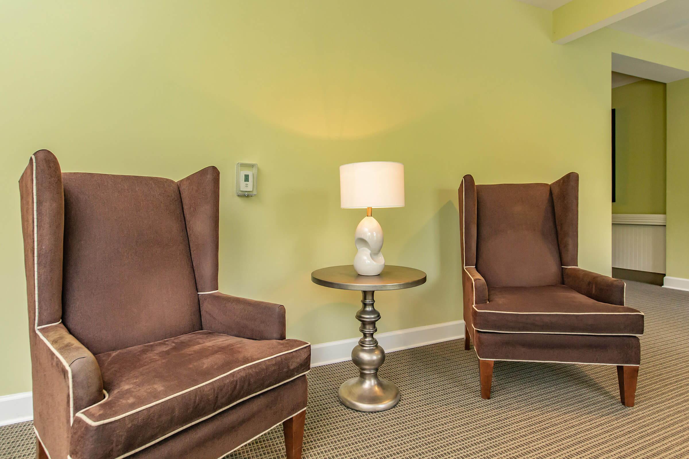 a brown leather couch in a living room