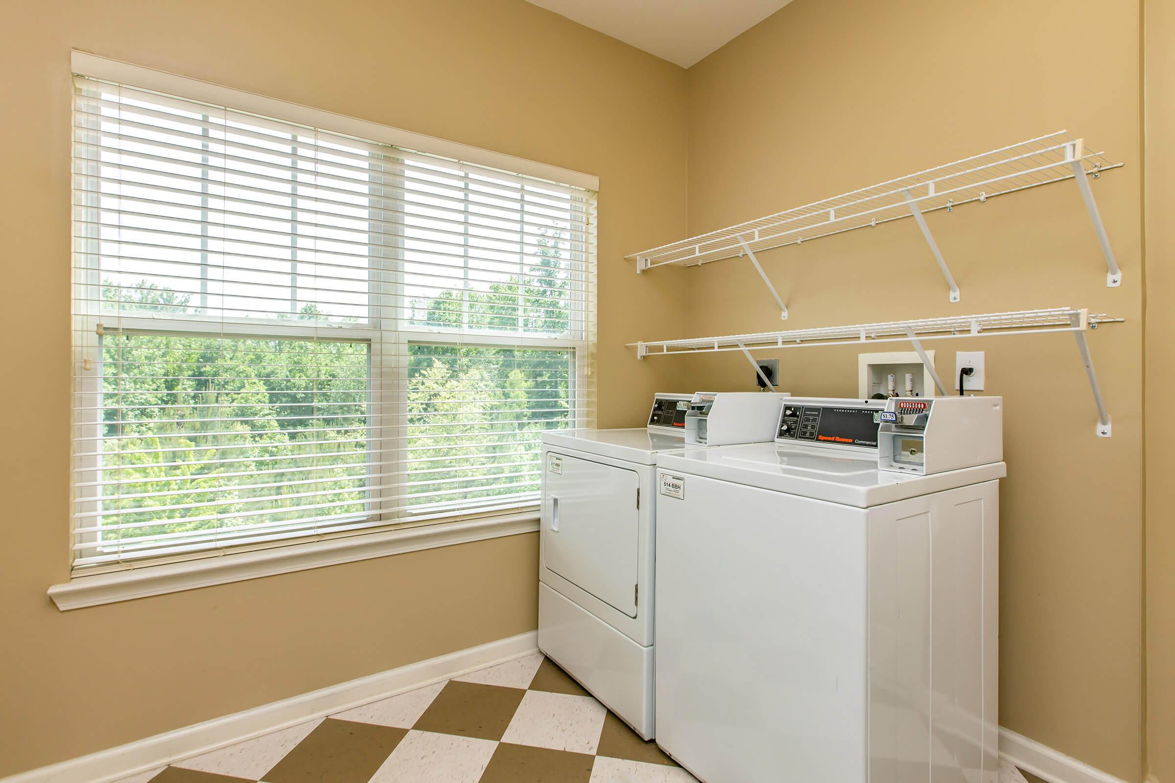 a room with a sink and a window