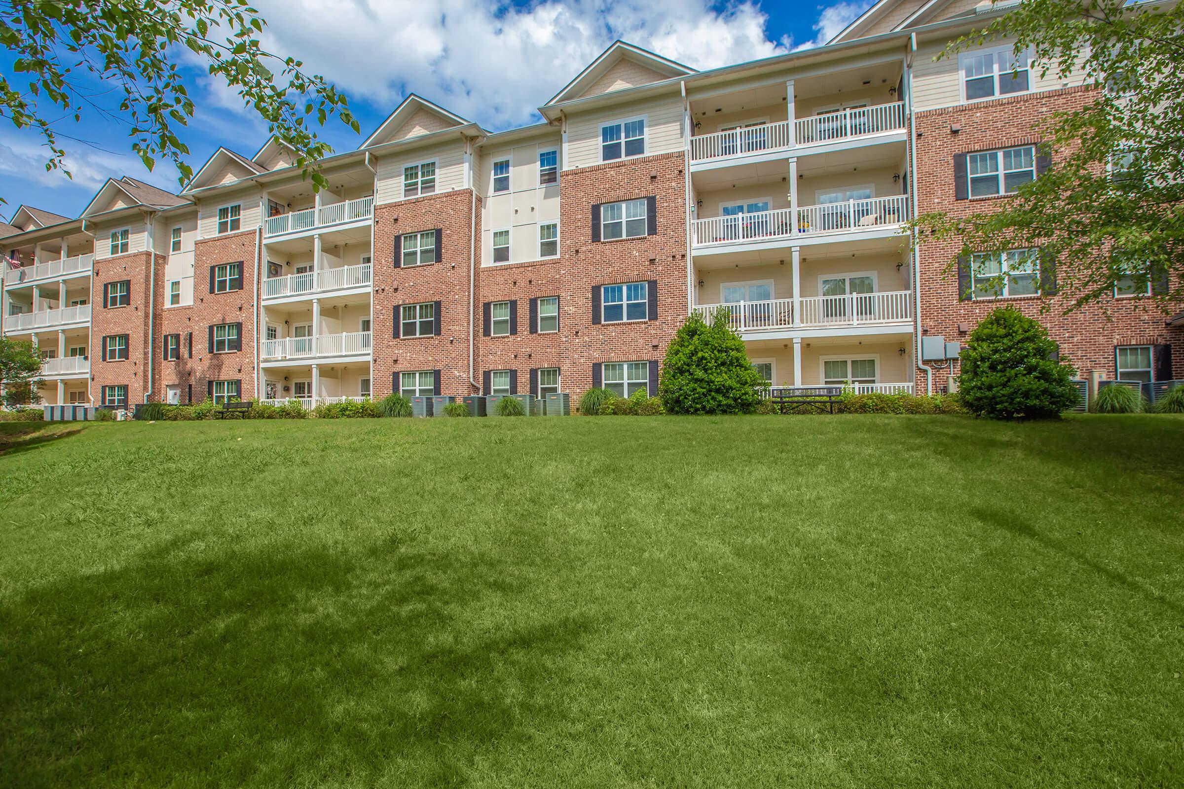 a large lawn in front of a building