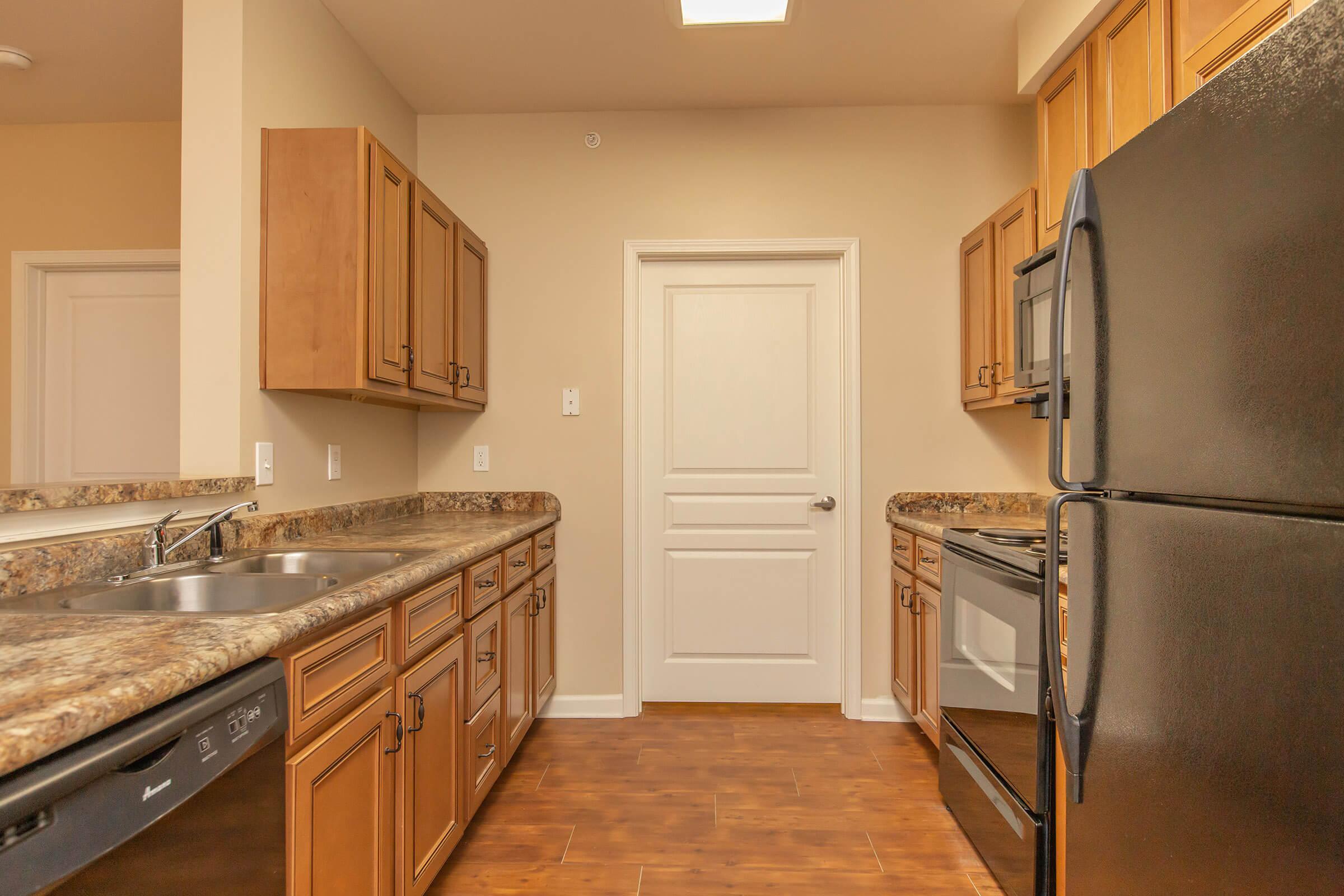 a stainless steel refrigerator in a kitchen