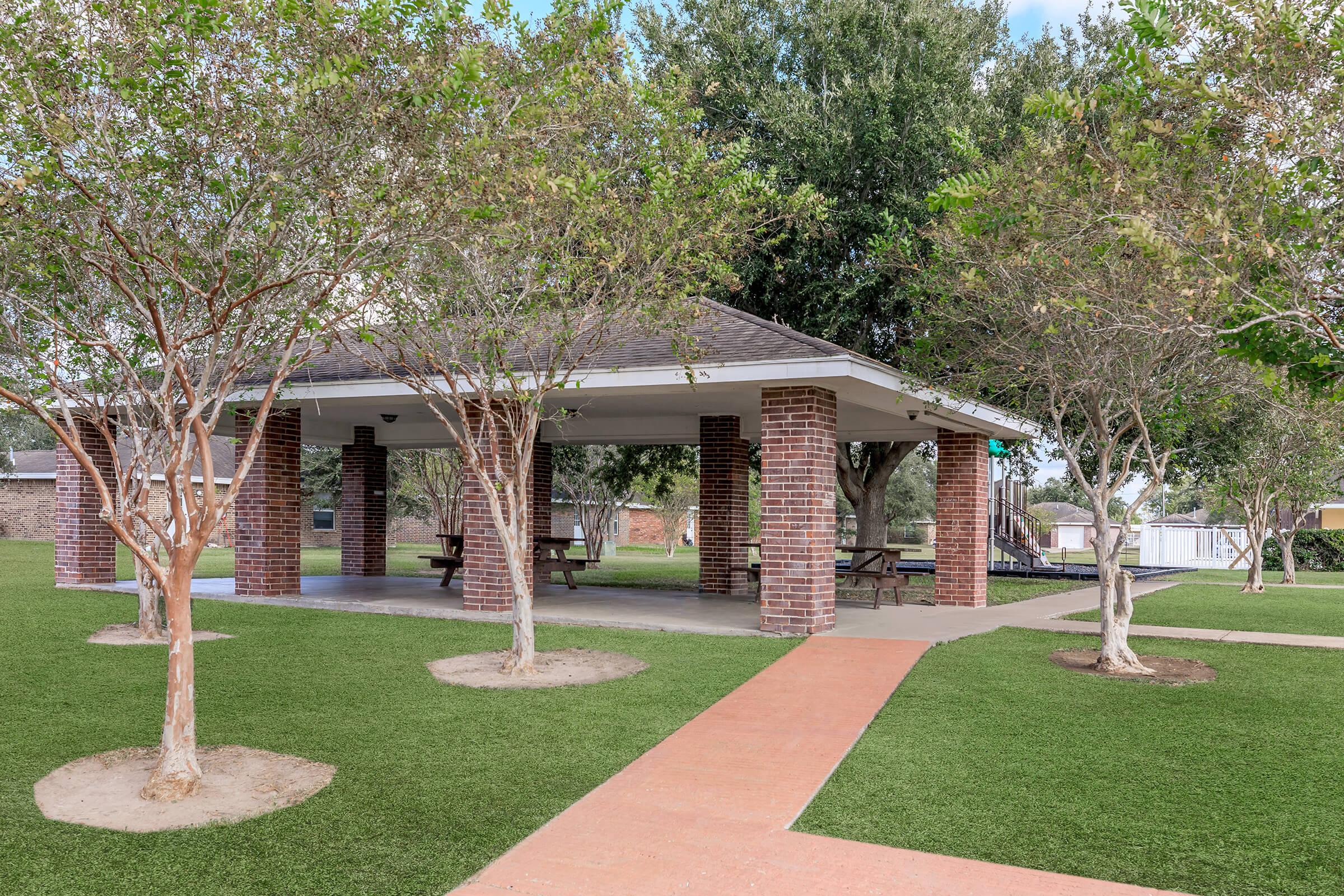 a large lawn in front of a house