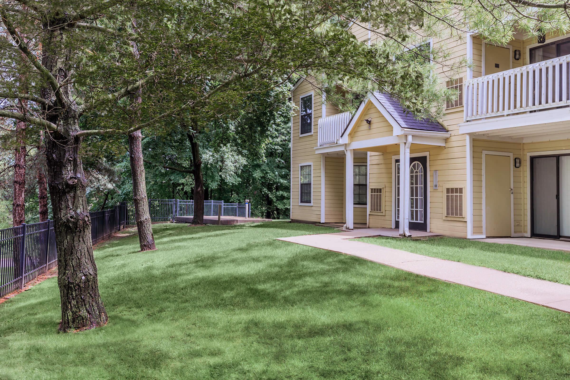 a large lawn in front of a house