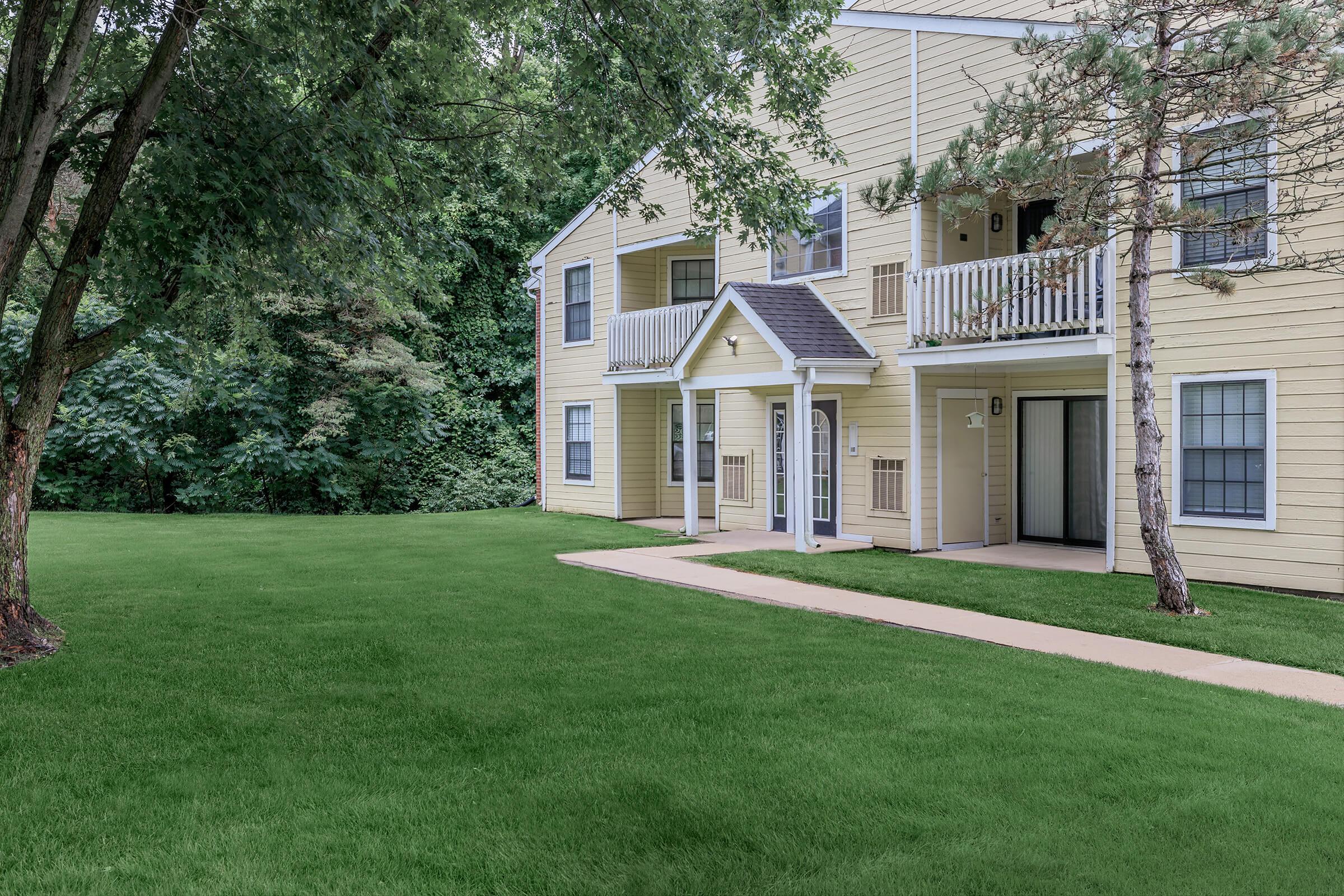 a large lawn in front of a house