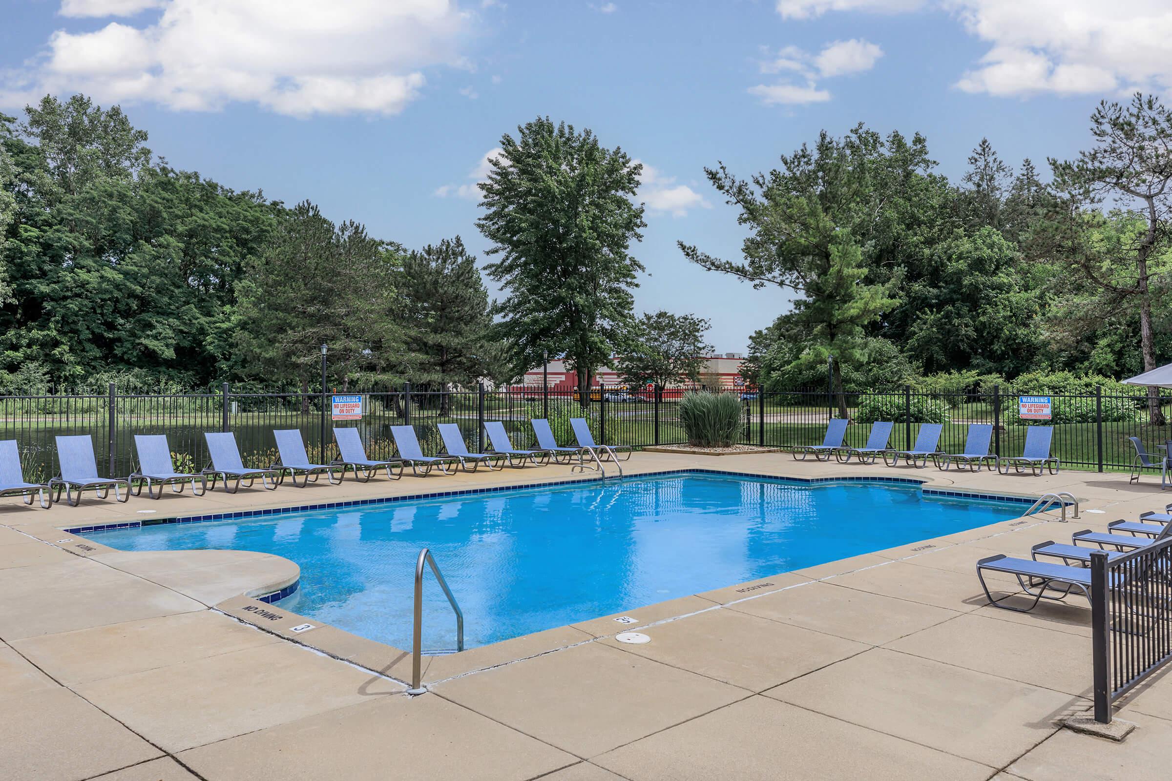 a pool next to a body of water