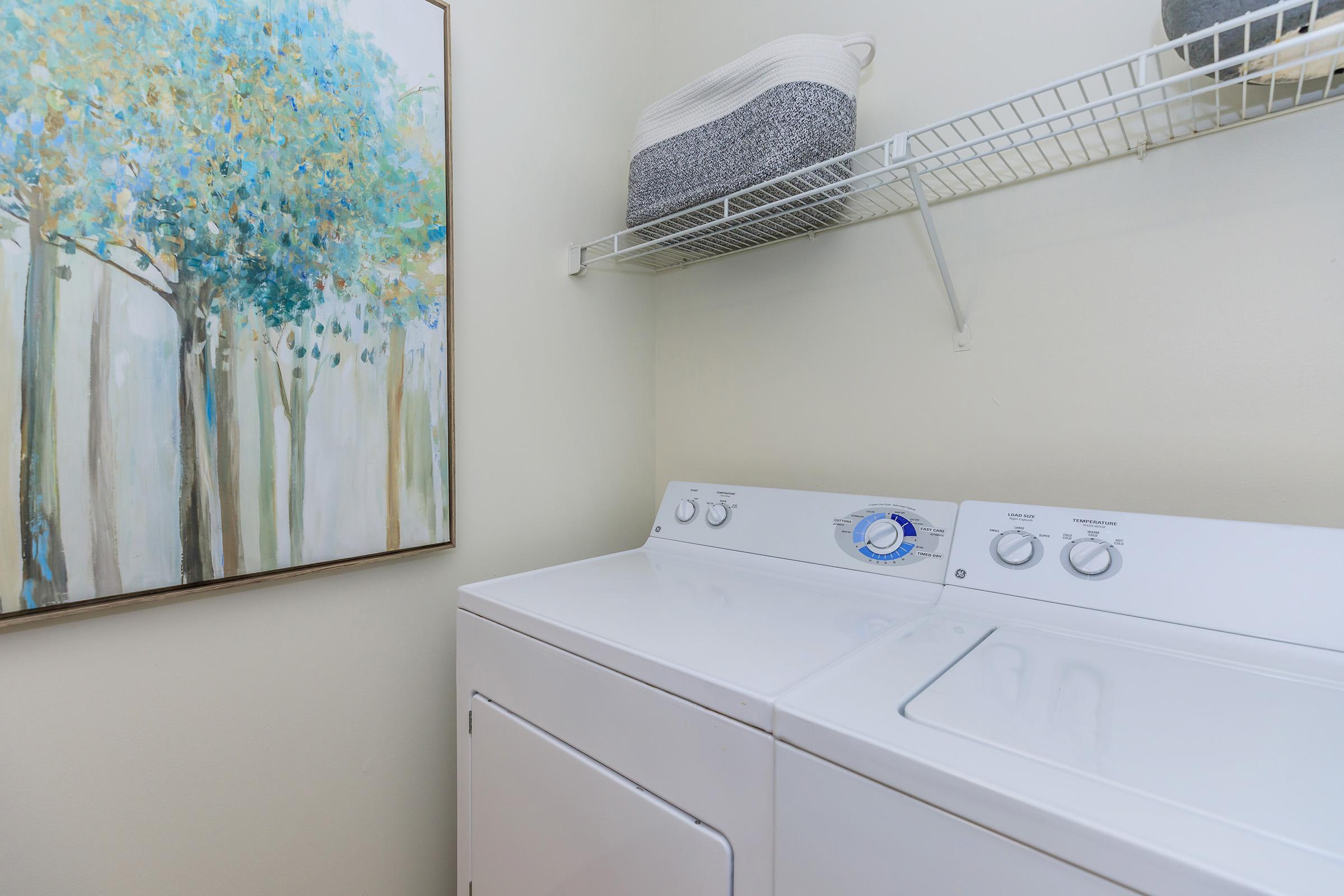 a kitchen with a sink and a mirror