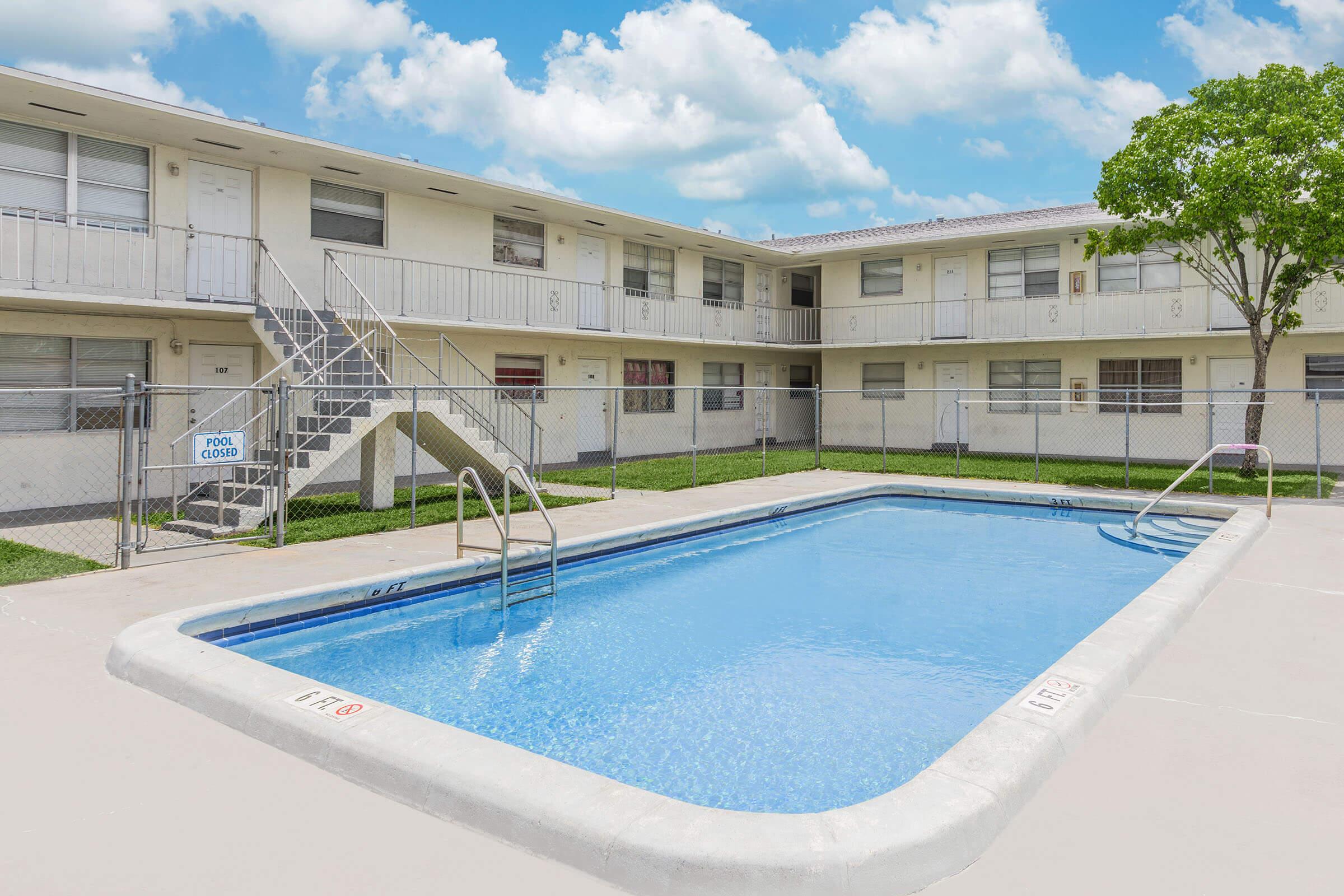 a pool next to a building