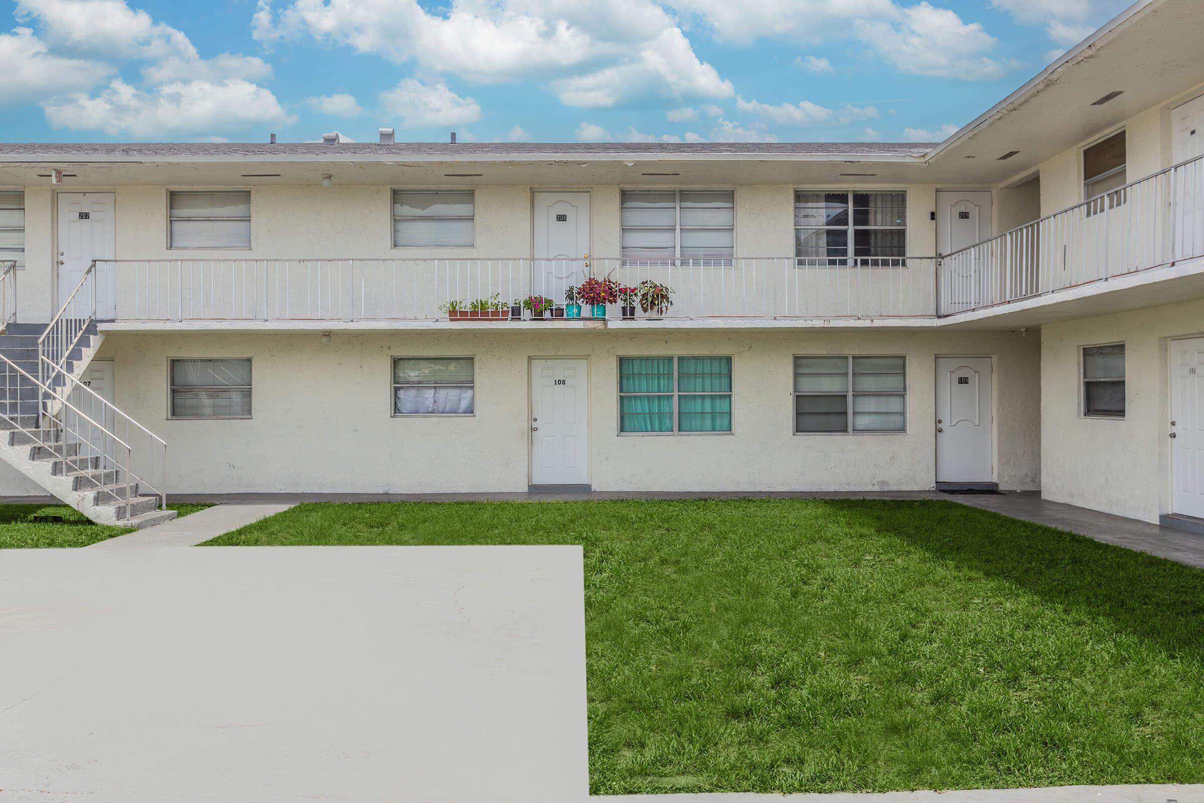 a large lawn in front of a house