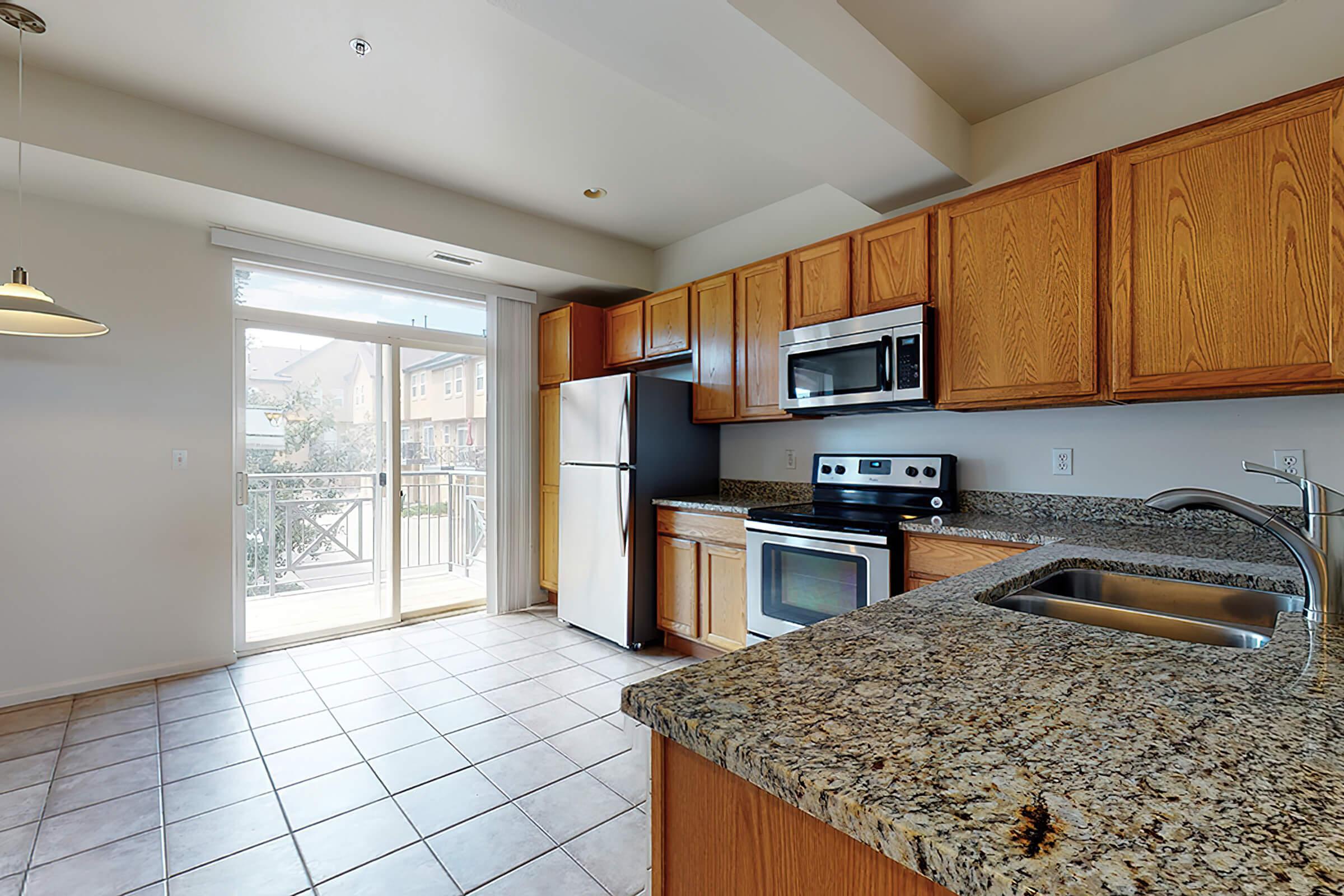 a kitchen with a large window