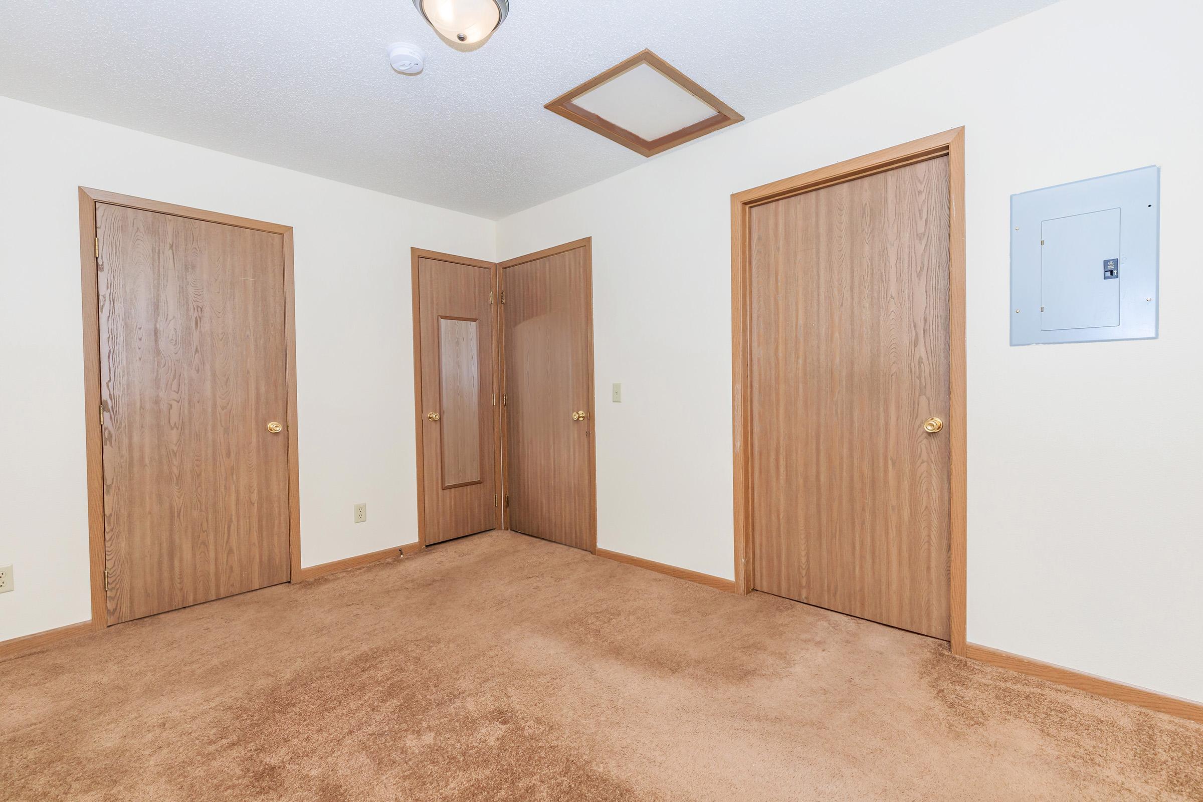 a wooden door in a room