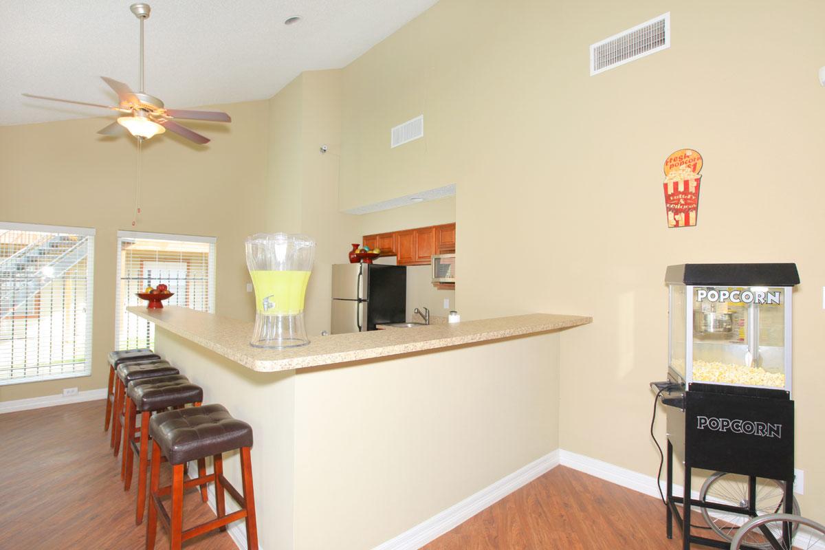 a kitchen with a dining room table