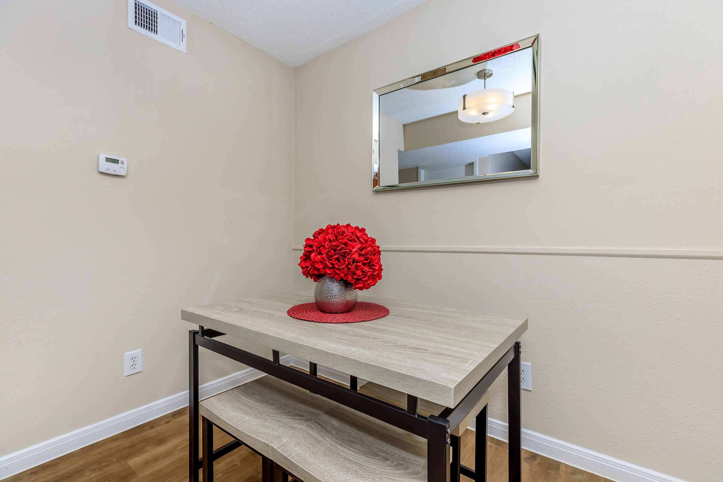 a bedroom with a large mirror