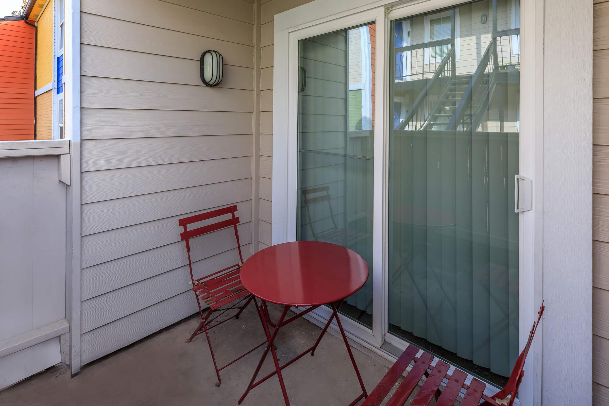 a chair sitting in front of a window