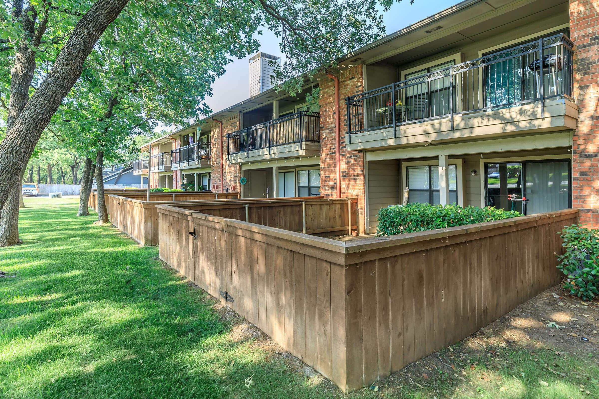 Timberline Condominiums community building with wooden fences