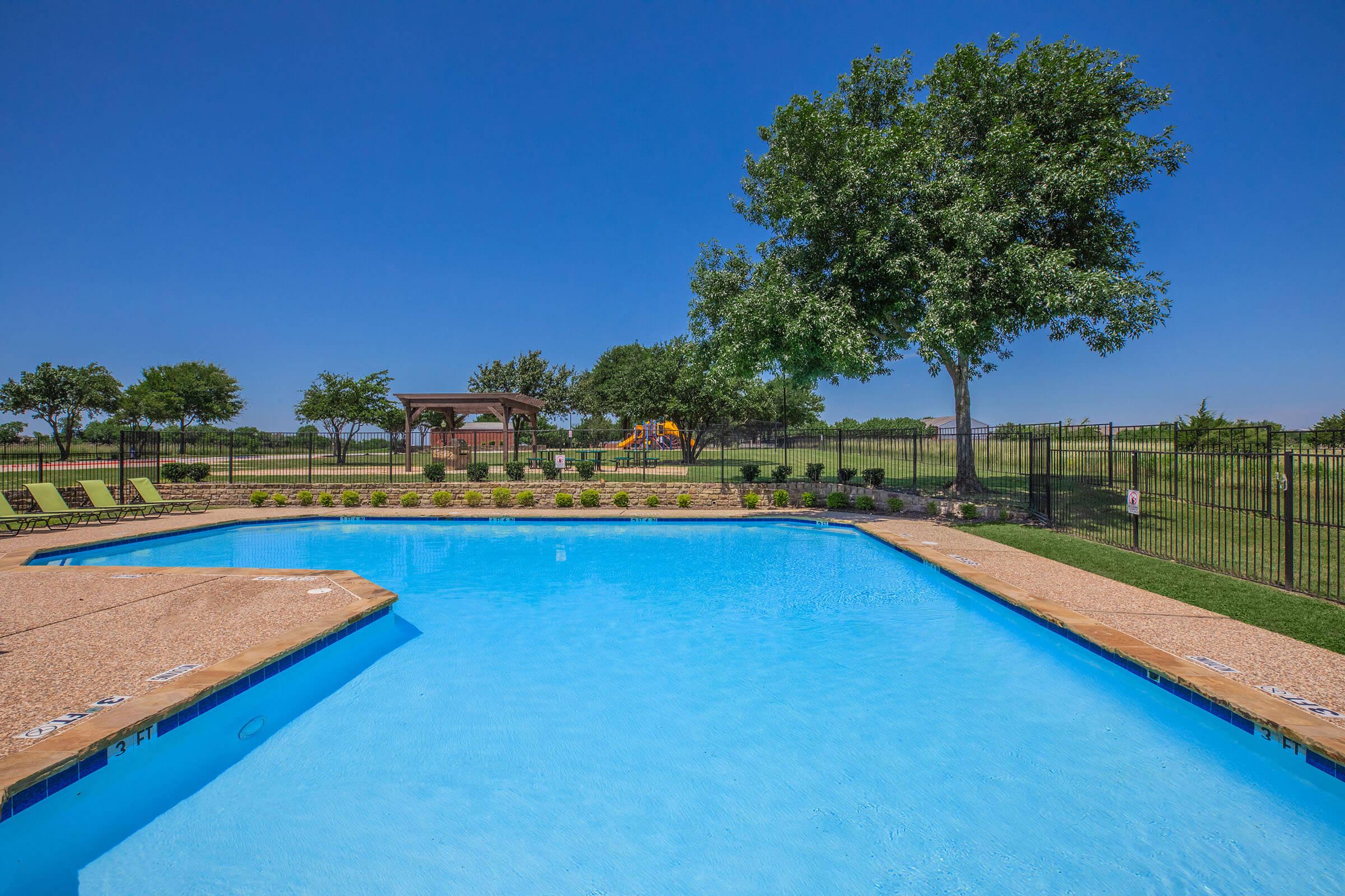 a pool next to a body of water