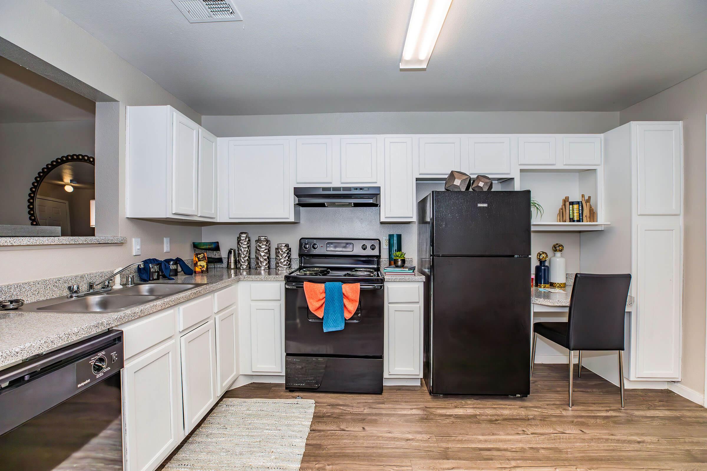 a modern kitchen with stainless steel appliances