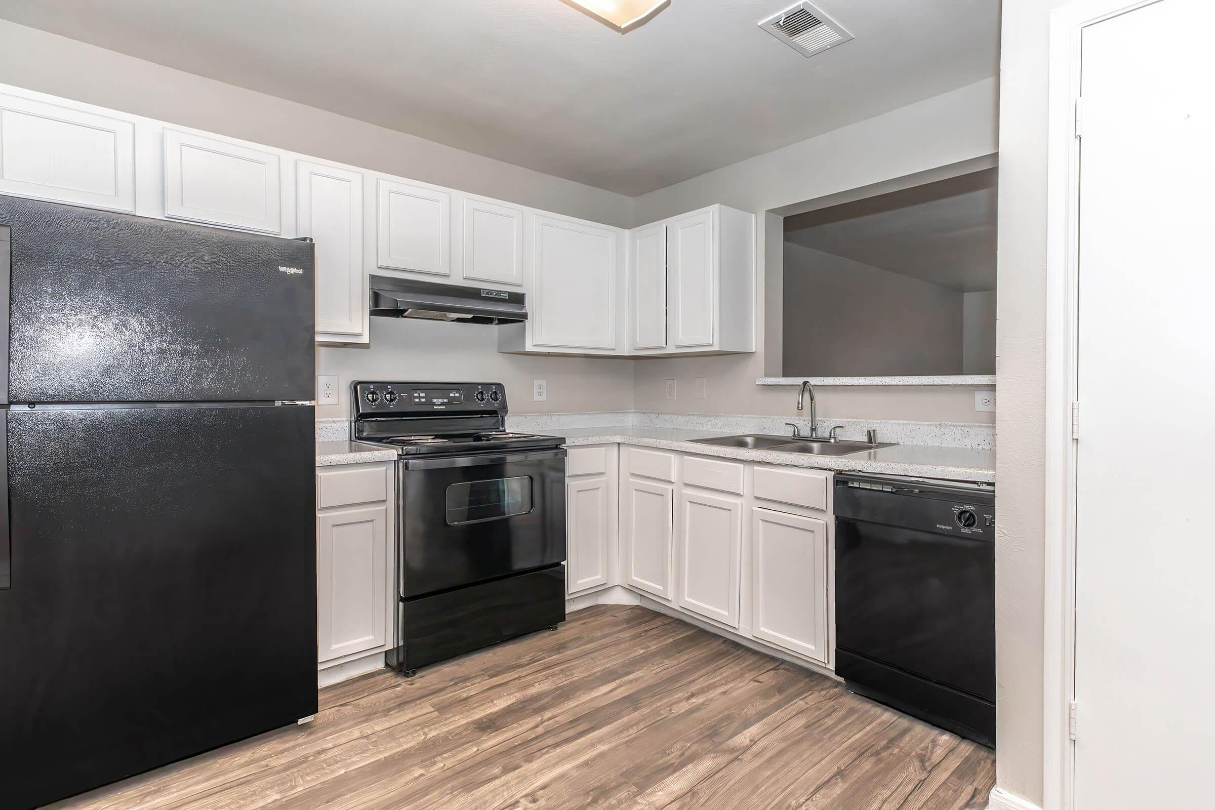 a stainless steel refrigerator in a kitchen