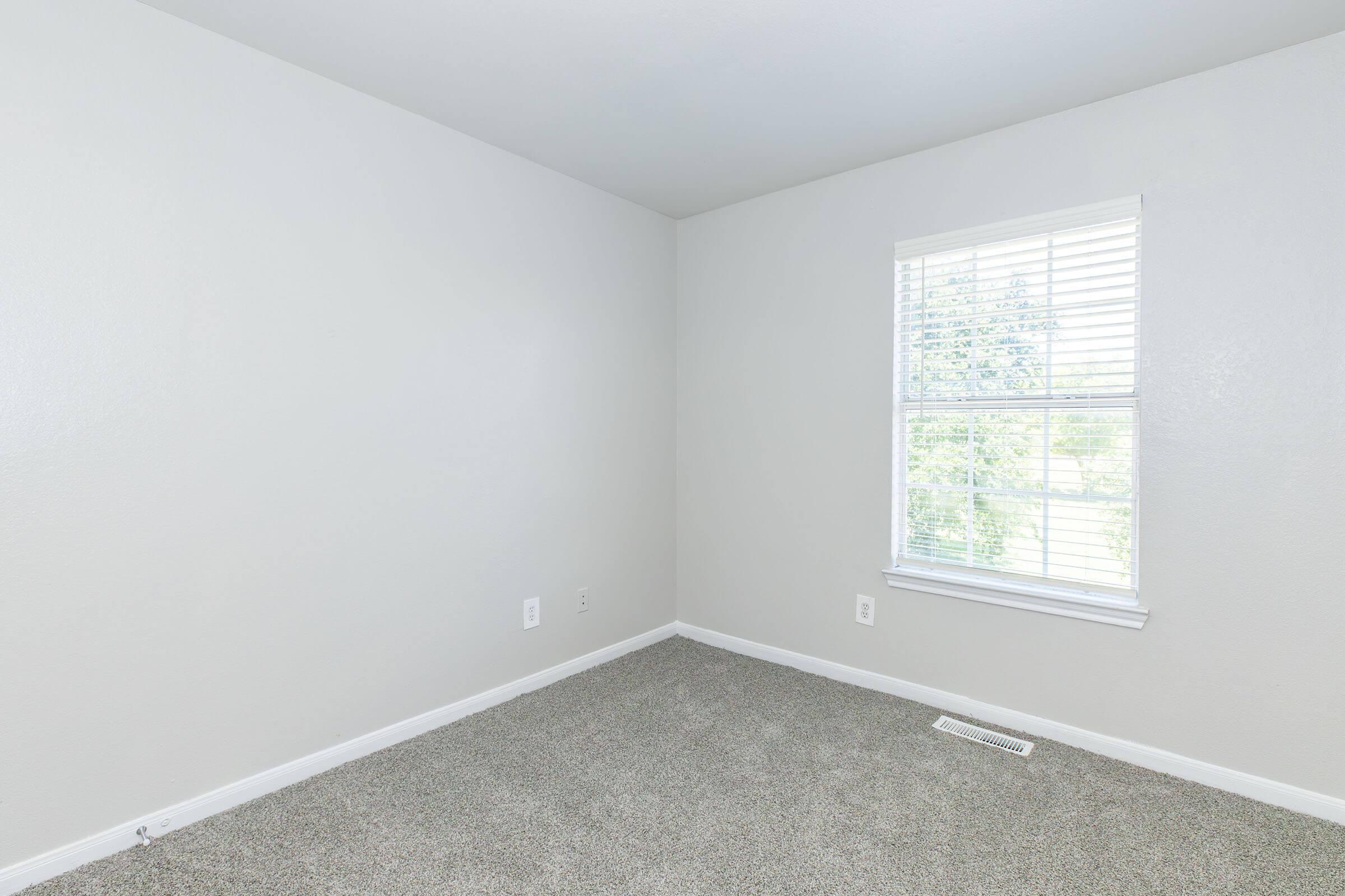 a room with a sink and a window