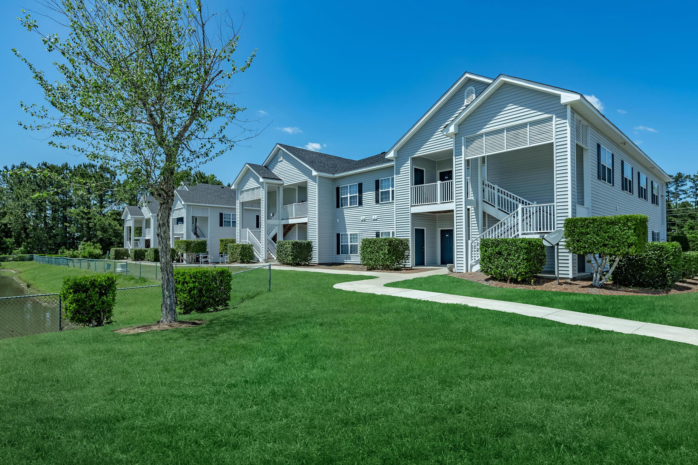 a large lawn in front of a house